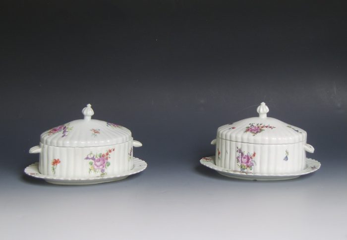 Pair of Longton Hall porcelain butter tubs and stands